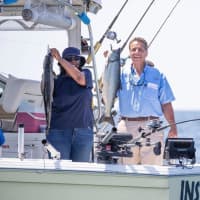 <p>New York Gov. Andrew Cuomo and Attorney General Letitia James his the water upstate during a fishing trip in Oswego.</p>