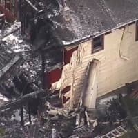 <p>A look at the house that became engulfed in flames after the crash.</p>
