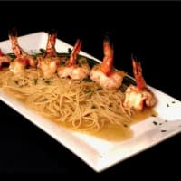 <p>A dish of Shrimp Scampi at Bistro 25 is among many choices on a varied menu.</p>
