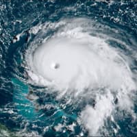 <p>The eye of slow-moving monster storm Dorian, now a Category 5 hurricane with 175 mph winds, is about 200 miles east of West Palm Beach, Florida,  on Sunday morning, Sept. 1.</p>