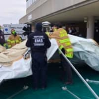 <p>Monmouth County EMS crews set up &quot;surge tents&quot; to help screen patients arriving at CentraState Medical Center in Freehold and Jersey Shore University Medical Center in Neptune City.</p>