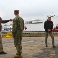 <p>Gov. Andrew Cuomo, left, and State Health Director Dr. Howard Zucker, far right, with officials at New York Harbor as the 1,000-bed US Navy Hospital Ship Comfort arrives late Monday morning, March 30 before docking at Pier 90.</p>
