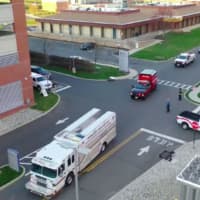 <p>The first of about two dozen firefighting and EMS apparatus driving by Jersey Shore University Medical Center in Neptune City.</p>