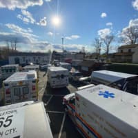 <p>A procession of Monmouth County EMS, firefighters and police outside Robert Weber&#x27;s home in Middletown.</p>
