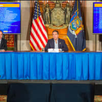 <p>Gov. Andrew Cuomo flanked by state health director Howard Zucker and Cuomo&#x27;s top aide Melissa DeRosa at the daily COVID-19 news briefing on Saturday, April 25 in Albany.</p>