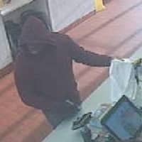 <p>A man is wanted after an armed robbery at McDonald&#x27;s in Commack.</p>