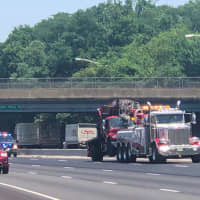 <p>Traffic backed up along the southbound side of Route 287 after a crane overturned Monday morning.</p>