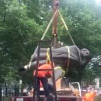 <p>A 60-year-old statue of Christopher Columbus was removed by a Trenton public works crew on Wednesday.</p>