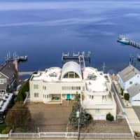 <p>Joe Pesci&#x27;s $6.5 million bayfront mansion in Lavallette and a neighbor&#x27;s long disputed dock (far right) approved by the state in 2018.</p>
