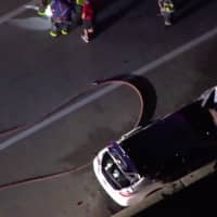 <p>A car burst into flames on Wednesday night along I-295 in Hamilton Township. (Chopper6 ABC News Philly)</p>