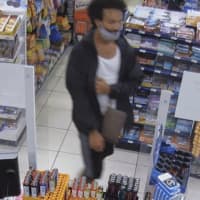 <p>Photos have been released by police in Norwalk of a man wanted in connection to a car burglary.</p>