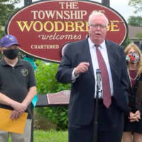 <p>Woodbridge Mayor John E. McCormac announces a $10,000 donation from Amazon as it opens its new delivery station in Avenel.</p>