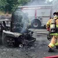 <p>The aftermath of the burning car wreck that 18-year-old Justin Gavin braved to save a woman he had never met and her three children.</p>