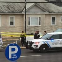 <p>Police assist a shooting victim in Seaside Park. (Photo courtesy Seaside Heights Scanner News)</p>