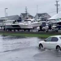 <p>Rising floodwaters stranded motorists along Ocean Avenue. (Courtesy Sea Bright Fire Rescue)</p>