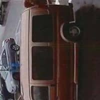 <p>The older-model Chevrolet van, driven by a third woman, that the thieves used to flee the scene.</p>