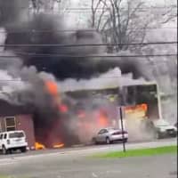<p>Smoke billows out of Stoms ABS Automotive in Middlesex (Photo Courtesy Lincoln Hose Co. 1)</p>