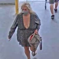 <p>A photo of the wanted woman captured on surveillance video.</p>