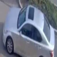 <p>Surveillance footage of the sedan that the woman used to flee the scene.</p>