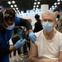 <p>Some New Yorkers are among the first to receive COVID-19 vaccines at sites set up by the state.</p>