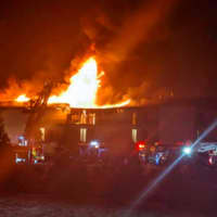 <p>Washington Township firefighters assisted Gloucester Township in battling a four-alarm blaze at the Howard Johnson Express Inn in Blackwood.</p>