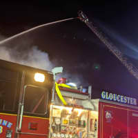 <p>A Gloucester Township Fire Department tower truck used to battle the overnight Howard Johnson Inn fire in Blackwood.</p>