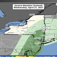 <p>A look at areas (in darker green) where there is a higher risk of severe thunderstorms on Wednesday, April 21.</p>