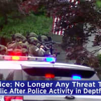 <p>SWAT team members descend on a standoff in Gloucester County. (Courtesy of CBS Eyewitness News Philly)</p>