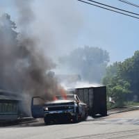 <p>The fire was reported in the area of Woodport Road and East Mountain Road in Sparta just before 11 a.m., town police said.</p>