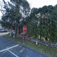 <p>A driver was charged with allegedly driving while intoxicated after crashing into a stone wall at 153 Compo Road North in Westport, police said.</p>
