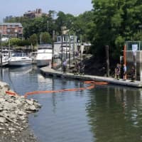 <p>Crews worked quickly to mitigate the damage following a manhole explosion in New Rochelle Harbor.</p>