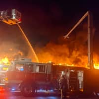 <p>Explosions rocked the U.S. Auto Auction building which was destroyed by fire Tuesday night.</p>