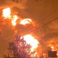 <p>A gas explosion is suspected to have sent this ball of flames flying from a tanker truck crash.</p>