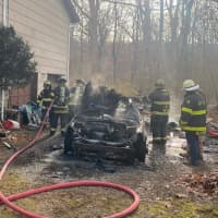 <p>The Byram Township Fire Department responded to the fully involved blaze next to a home in the Brookwood section of town around 3:45 p.m.</p>