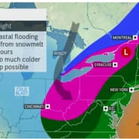 <p>A look at storm activity on Thursday, Feb. 17, with areas expected to see thunderstorms (green), downpours (dark green), a mix of rain and sleet (pink), and snow (blue).</p>
