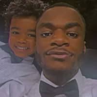 <p>Jamal Mustapha and his 4-year-old son Kyrie</p>