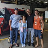<p>Kassandra with first responders</p>