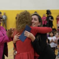 <p>Acting Commissioner Dr.  Angelica Allen-McMillan visits Elms Elementary School to present second grade teacher Shaina Brenner with the 2022 Milken Educator Awards Educator of the Year Award.</p>