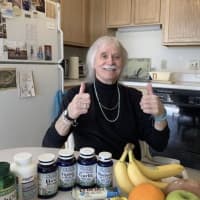 <p>Herbie Allen with his supplements and healthy foods.</p>