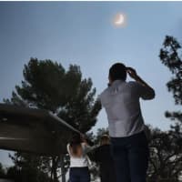 <p>Employees and visitors at NASA's Jet Propulsion Laboratory stopped to watch the solar eclipse on Monday, Aug. 21, 2017.
  
</p>