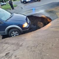 <p>This photo was taken of the sinkhole in Chicopee earlier today, July 15.</p>