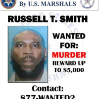 <p>Russell T. Smith, of Windsor, is suspected in the killing of two brothers outside of a Bloomfield bar on Feb. 22, police said.</p>