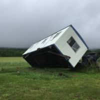 <p>Trailer flipped by a tornado in Carlisle</p>