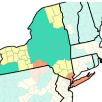 <p>Counties shown in orange are where the CDC advises wearing masks indoors. Yellow counties are places in which those at high risk for severe disease should be cautious, and in green counties, indoor masking is not necessary.</p>