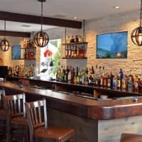 <p>The bar at the new Seafood Grill in Armonk pours a good selection of craft beers and fine wines.</p>