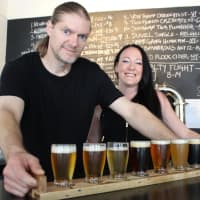 <p>Martijn Mollet and Jamie Lovelace, the owners of Seven Lakes Station craft beer taproom in Sloatsburg.</p>