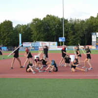 <p>Dancers from the Seven Star School entertain the crowd with one of their dance routines during the Hudson Valley Renegades game.</p>