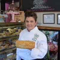 <p>Shannon Cheevers shows off one of her pies.</p>