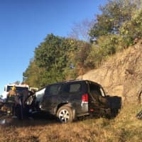 <p>Three people had to be extricated from this vehicle after it rolled over and crashed on Route 8 in Shelton on Friday. Their injuries were said to be minor. The cause of the accident is under investigation</p>