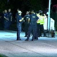 <p>Police search for a suspect after two men were shot in Spring Valley.</p>